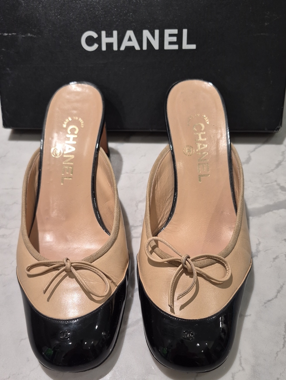 CHANEL Beige and Black Two-Tone Bow Mules